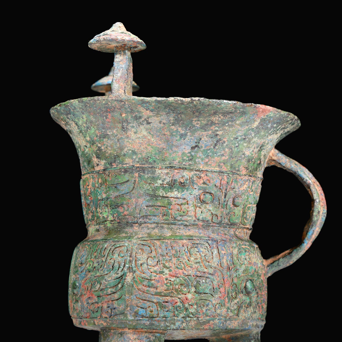 A Superb Bronze 'Animal Mask' Tripod Cup
