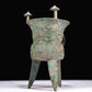 A Superb Bronze 'Animal Mask' Tripod Cup