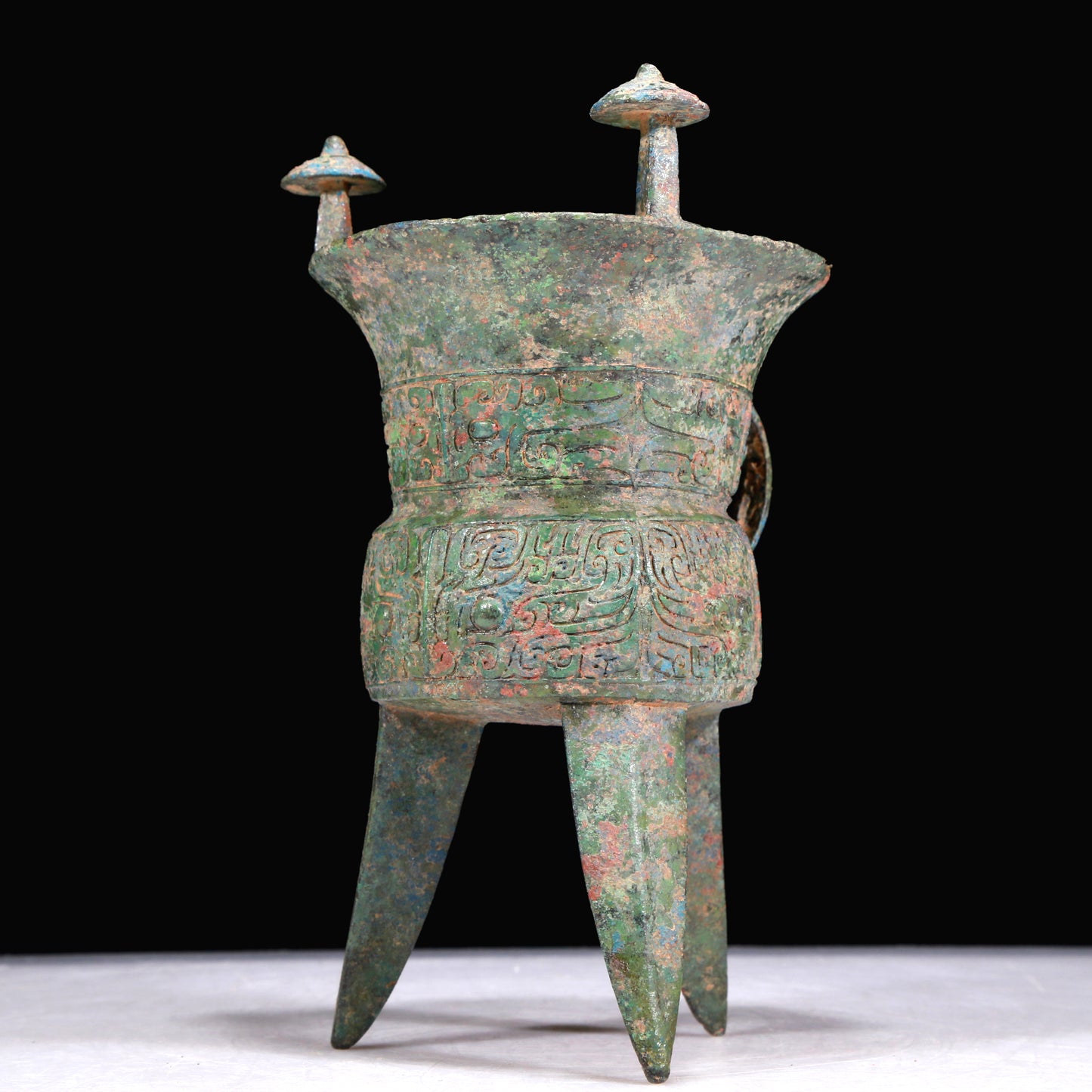 A Superb Bronze 'Animal Mask' Tripod Cup