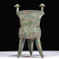 A Superb Bronze 'Animal Mask' Tripod Cup