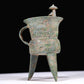A Superb Bronze 'Animal Mask' Tripod Cup