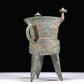 A Superb Bronze 'Animal Mask' Tripod Cup