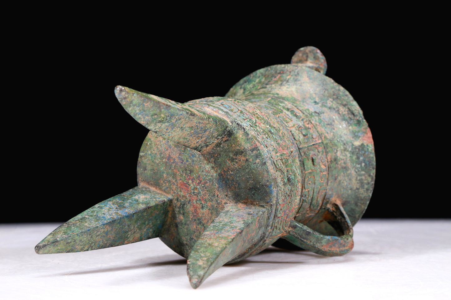 A Superb Bronze 'Animal Mask' Tripod Cup