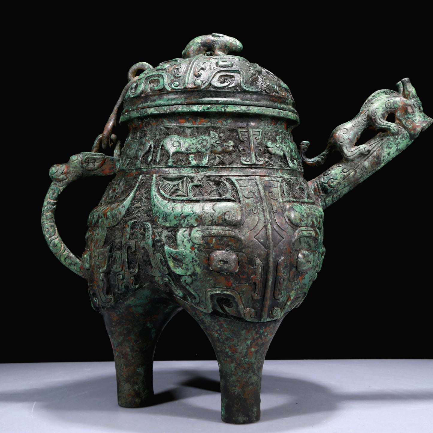 A Superb Bronze 'Animal Mask' Tripod Ewer With Inscriptions