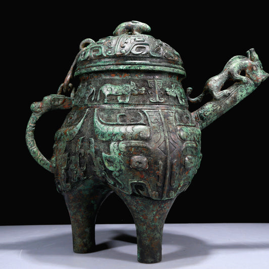 A Superb Bronze 'Animal Mask' Tripod Ewer With Inscriptions