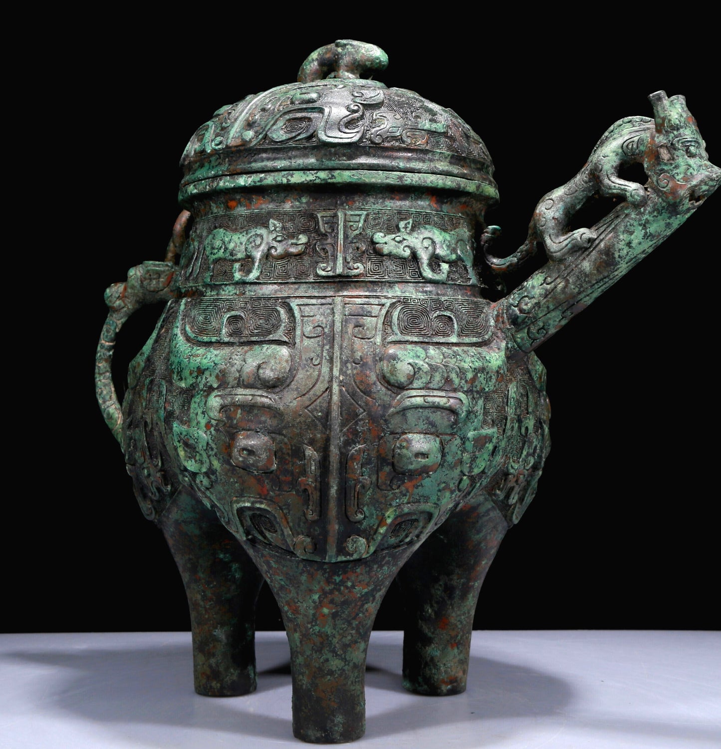 A Superb Bronze 'Animal Mask' Tripod Ewer With Inscriptions