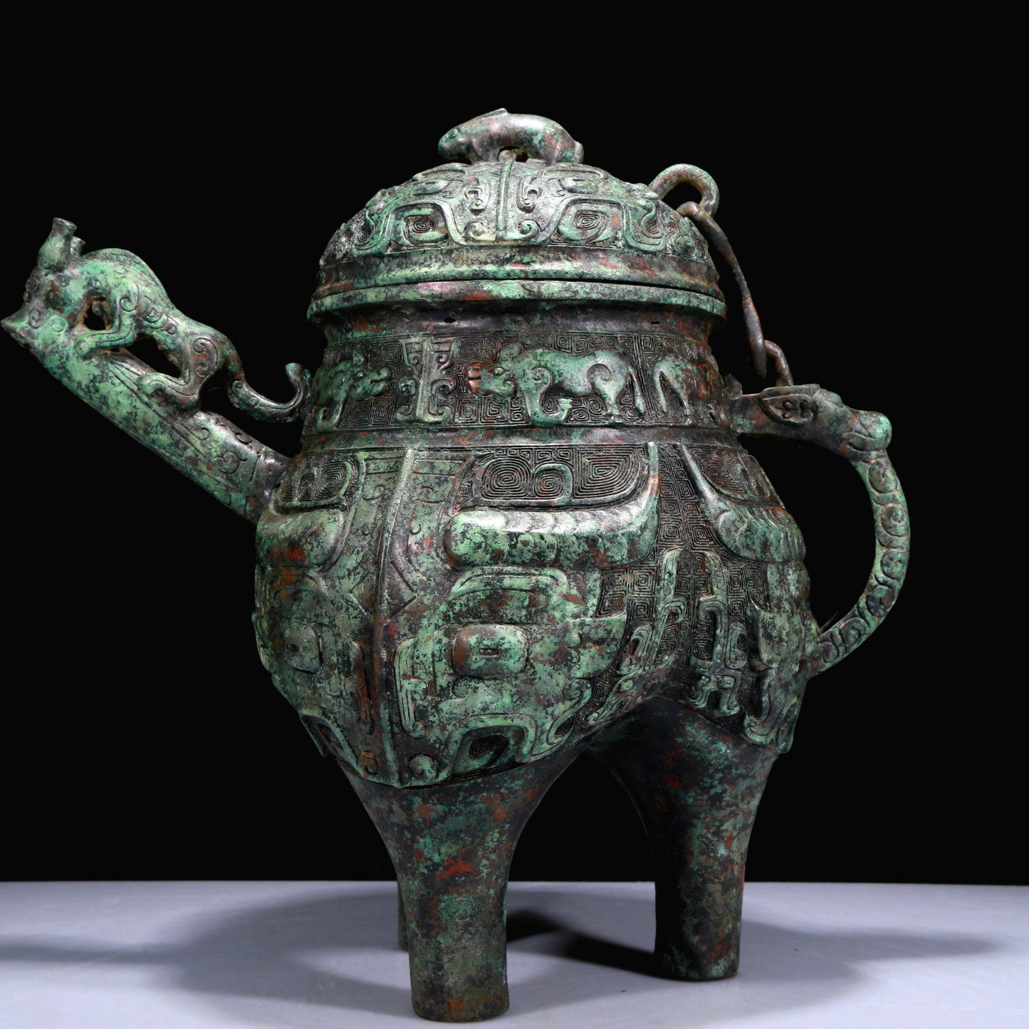 A Superb Bronze 'Animal Mask' Tripod Ewer With Inscriptions