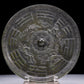 An Archaic Circular Bronze 'Auspicious Beast, Auspicious Cloud, The Eight Diagrams' Mirror