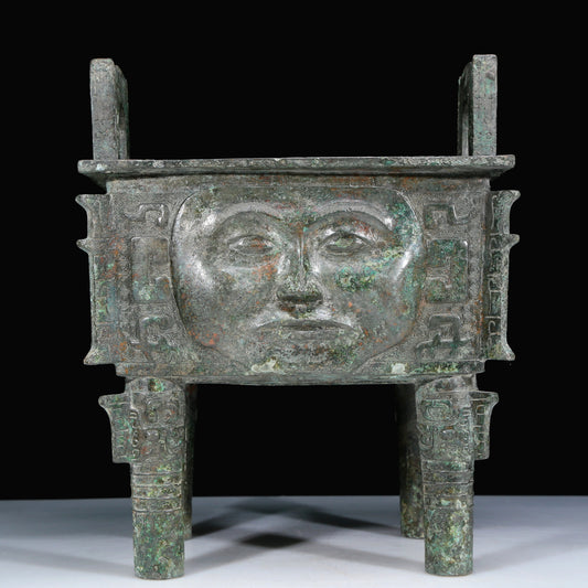 An Archaic Bronze 'Human Mask' Ritual Food Vessel, Ding