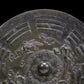 An Archaic Circular Bronze 'Auspicious Beast, Auspicious Cloud, The Eight Diagrams' Mirror