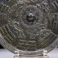 An Archaic Circular Bronze 'Auspicious Beast, Auspicious Cloud, The Eight Diagrams' Mirror