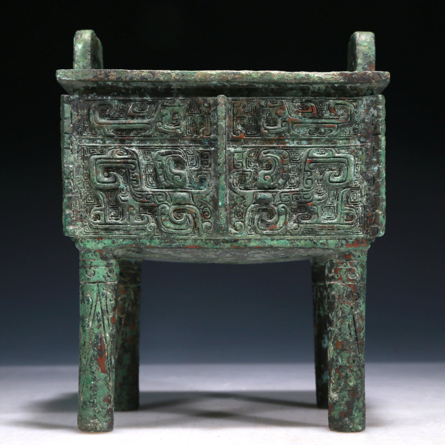 A Wonderful Bronze 'Animal Mask' Ritual Food Vessel, Ding, With Inscriptions