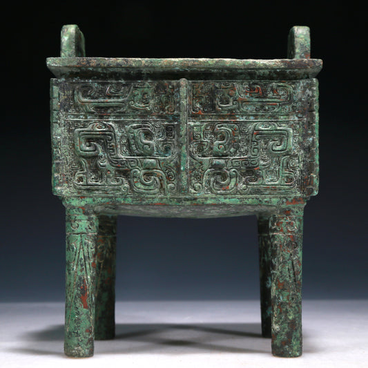 A Wonderful Bronze 'Animal Mask' Ritual Food Vessel, Ding, With Inscriptions
