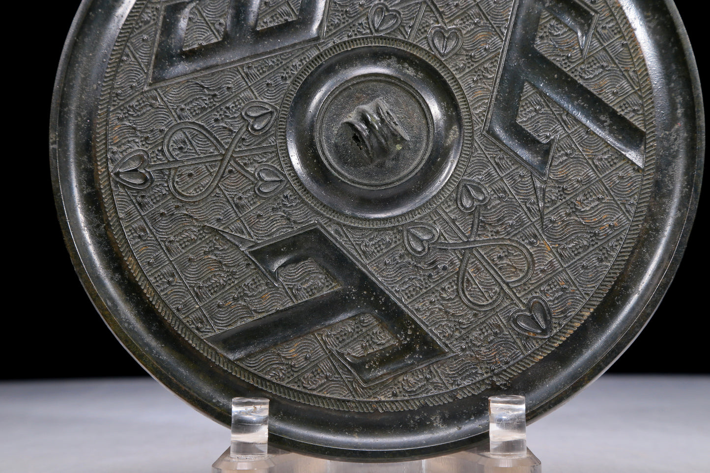 An Archaic Circular Bronze 'Ocean' Mirror