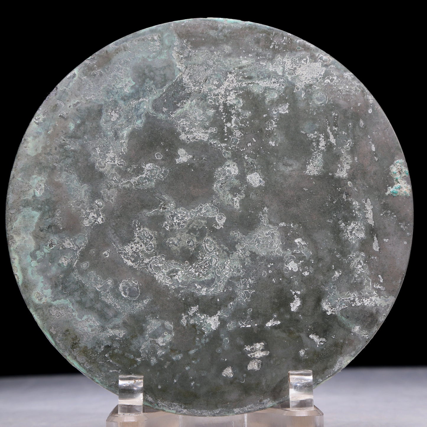 An Archaic Circular Bronze 'Ocean' Mirror