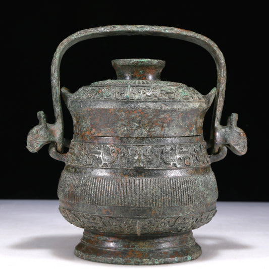 A Wonderful Bronze 'Mythical Bird' Beast-Handled Pot With Inscriptions And An Overhead Handle