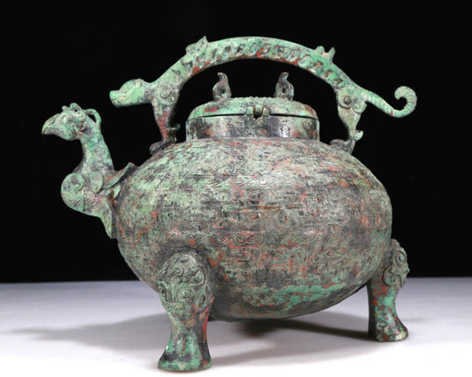 A Wonderful Bronze 'Auspicious Beast' Ewer