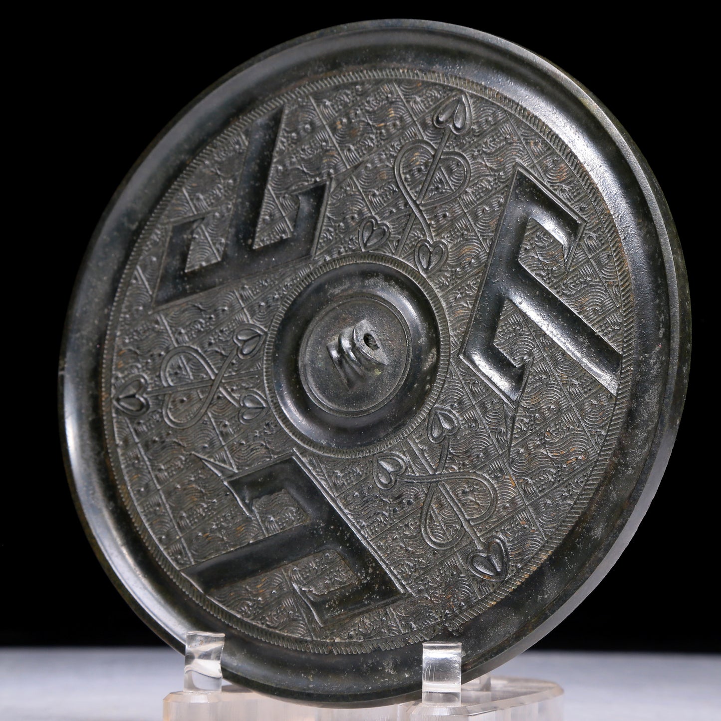 An Archaic Circular Bronze 'Ocean' Mirror