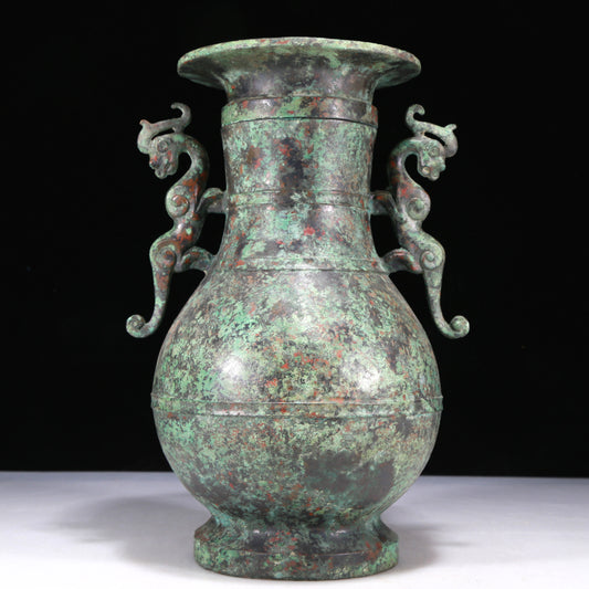 A Wonderful Bronze Dragon-Handled Vase And Cover