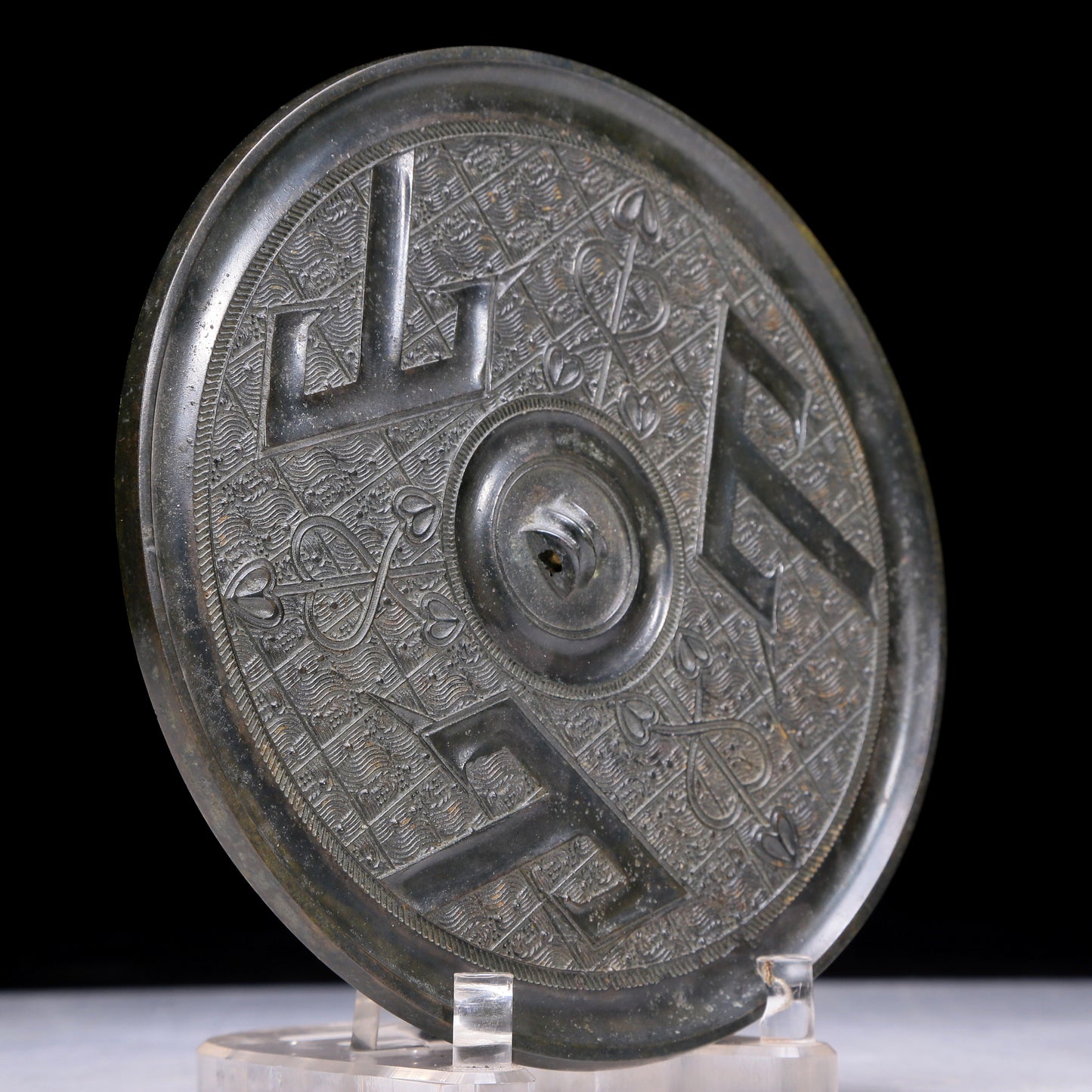 An Archaic Circular Bronze 'Ocean' Mirror