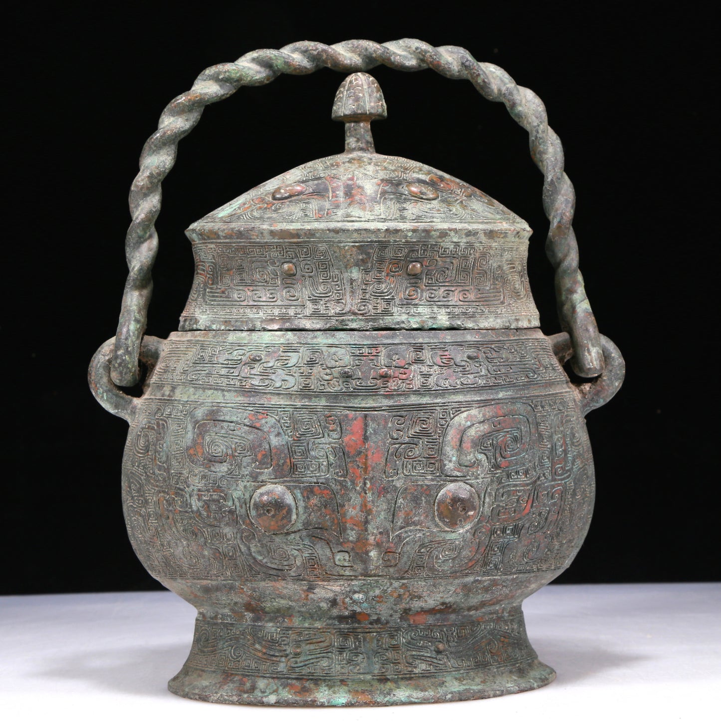 A Wonderful Bronze 'Animal Mask' Jar With Inscriptions And An Overhead Handle