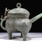 A Wonderful Bronze 'Auspicious Beast' Tripod Ewer