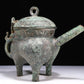 A Wonderful Bronze 'Auspicious Beast' Tripod Ewer
