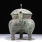 A Wonderful Bronze 'Auspicious Beast' Tripod Ewer