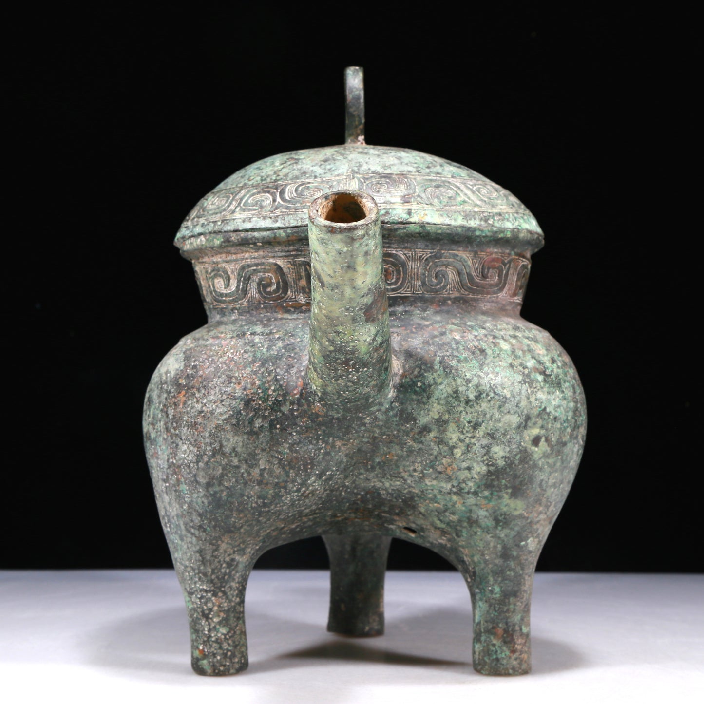 A Wonderful Bronze 'Auspicious Beast' Tripod Ewer