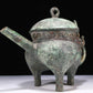 A Wonderful Bronze 'Auspicious Beast' Tripod Ewer