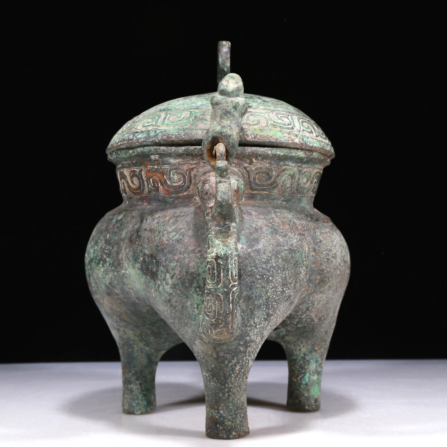 A Wonderful Bronze 'Auspicious Beast' Tripod Ewer