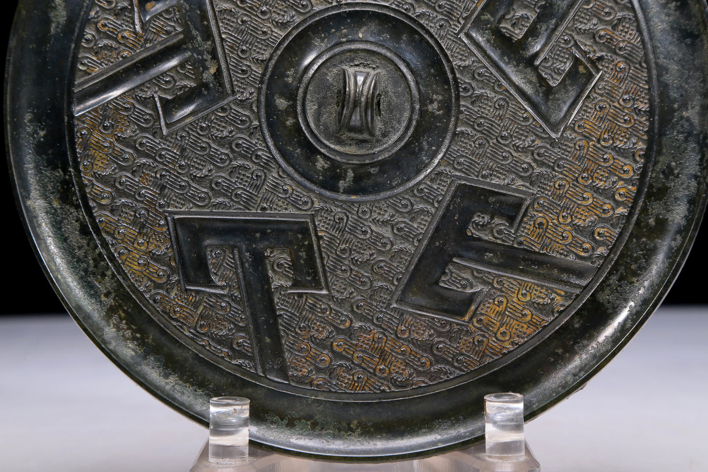 An Archaic Circular Bronze 'Ruyi' Mirror