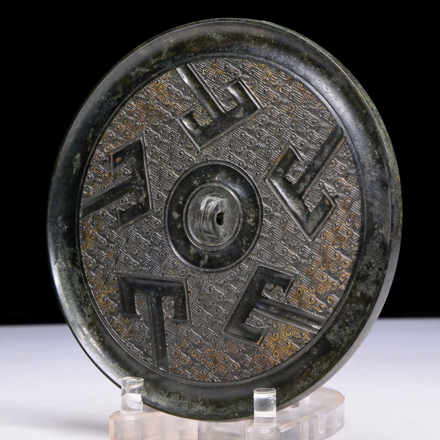 An Archaic Circular Bronze 'Ruyi' Mirror