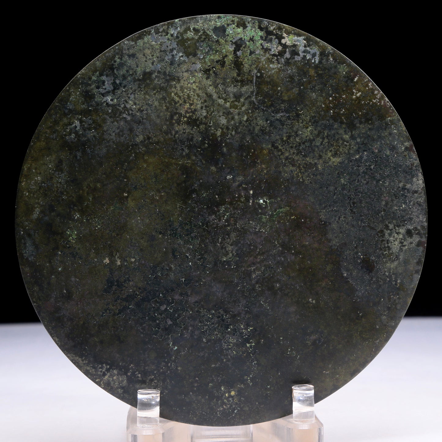 An Archaic Circular Bronze 'Ruyi' Mirror