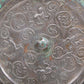 An Archaic Circular Bronze 'Flower& Auspicious Beast' Mirror