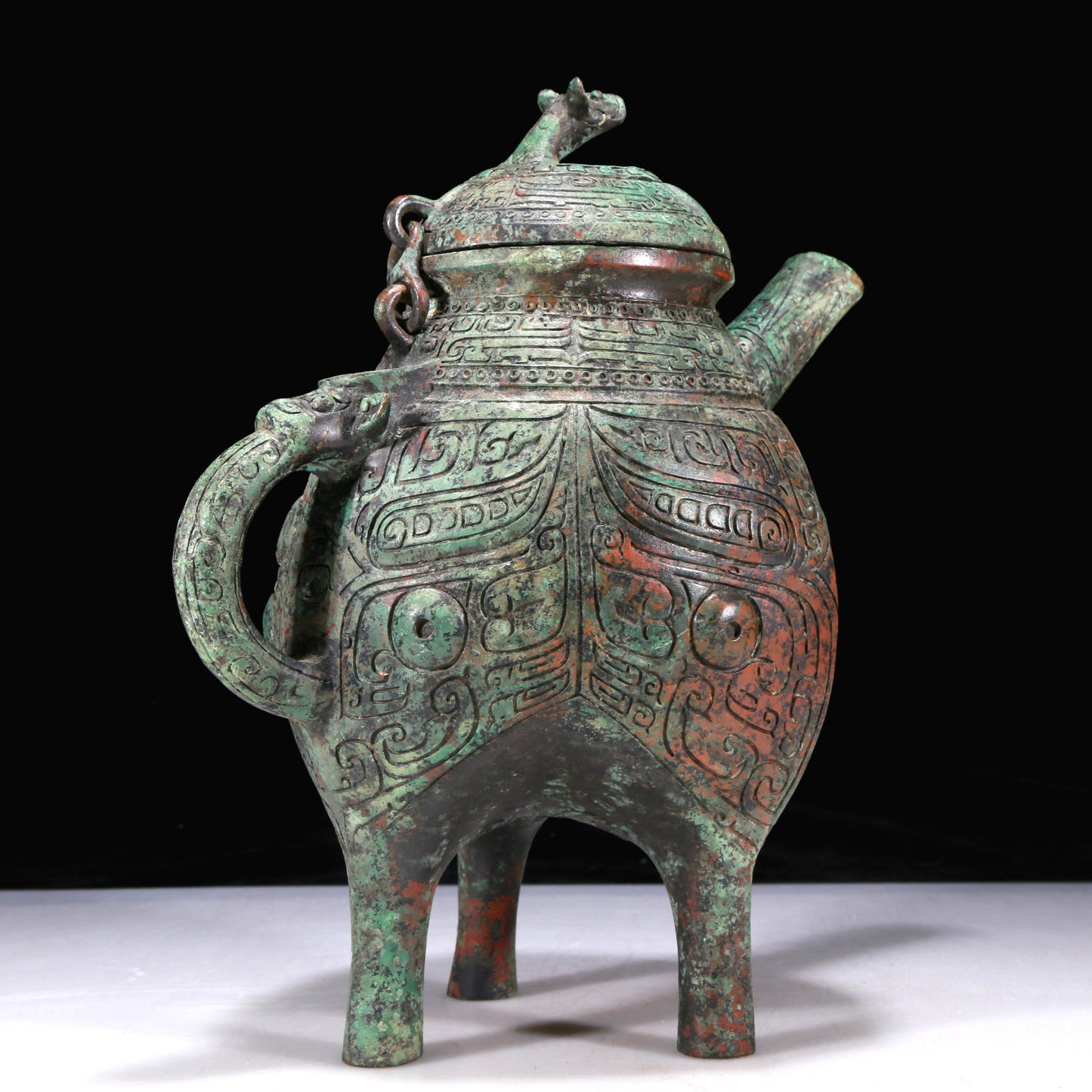 An Excellent Bronze 'Animal Mask' Tripod Ewer