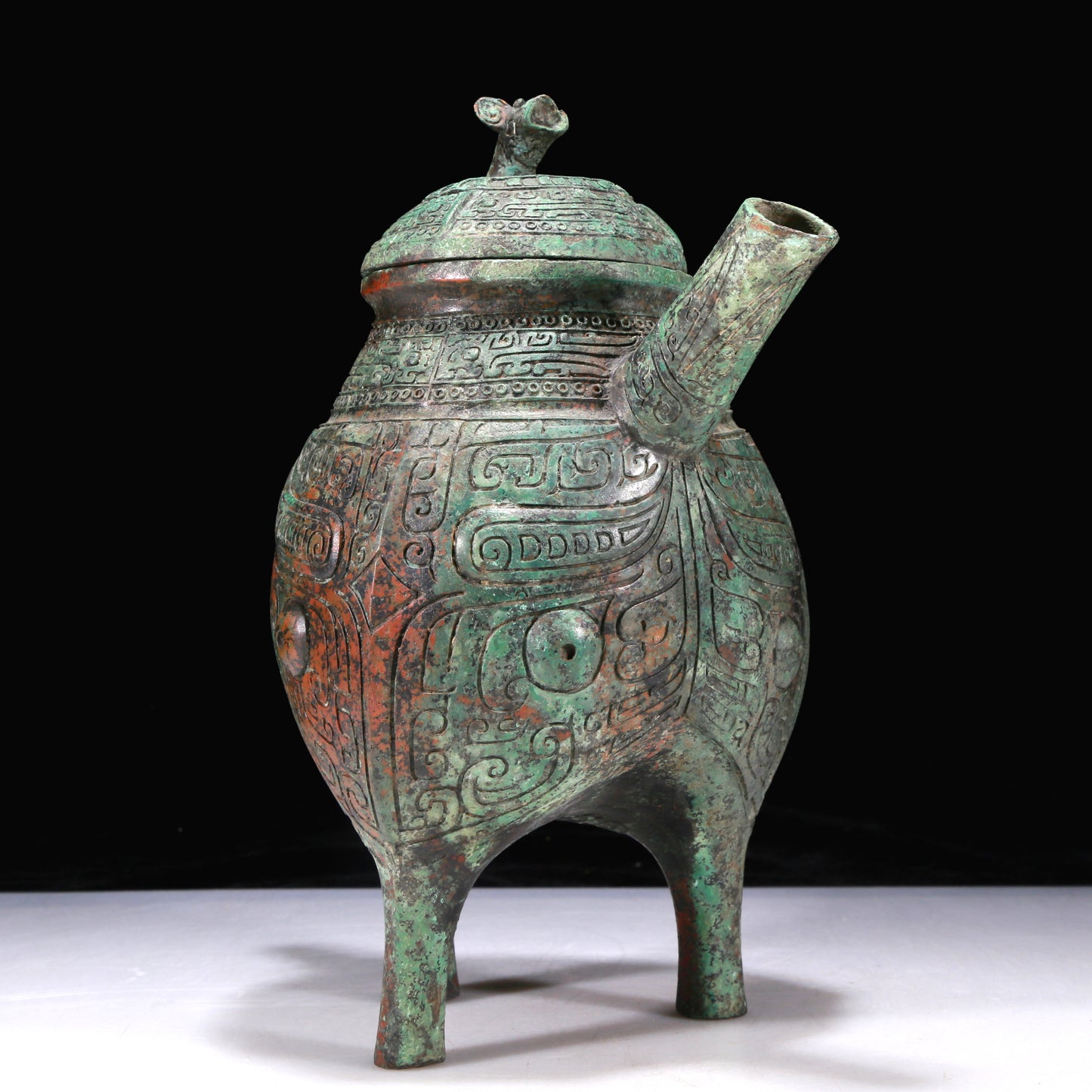 An Excellent Bronze 'Animal Mask' Tripod Ewer