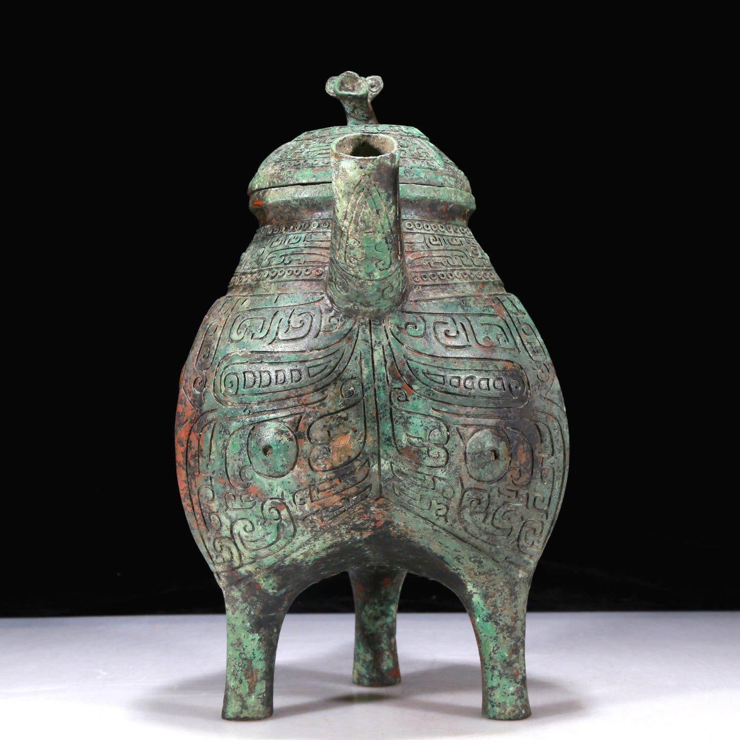 An Excellent Bronze 'Animal Mask' Tripod Ewer