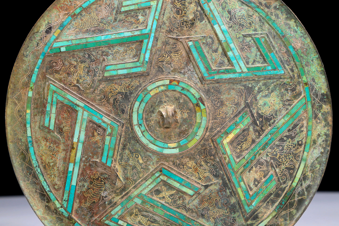 An Archaic Circular Bronze Turquoise& Gold& Silver-Inlaid 'Auspicious Beast' Mirror