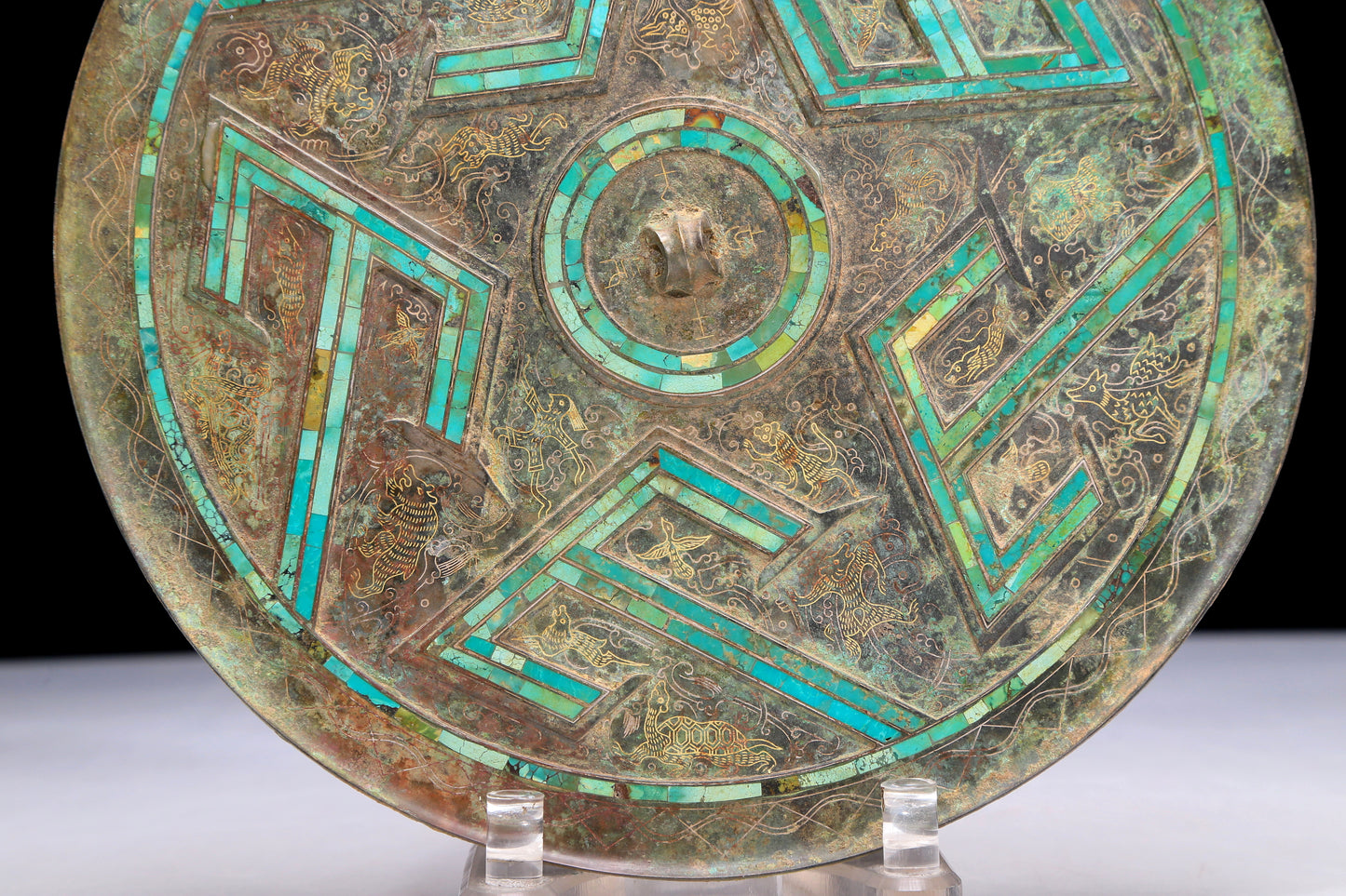 An Archaic Circular Bronze Turquoise& Gold& Silver-Inlaid 'Auspicious Beast' Mirror