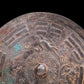 An Archaic Circular Bronze 'Auspicious Beast, Auspicious Cloud, The Eight Diagrams' Mirror