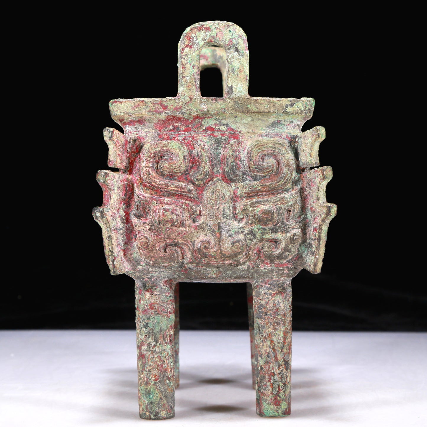 An Excellent Bronze 'Animal Mask' Ritual Food Vessel, Ding