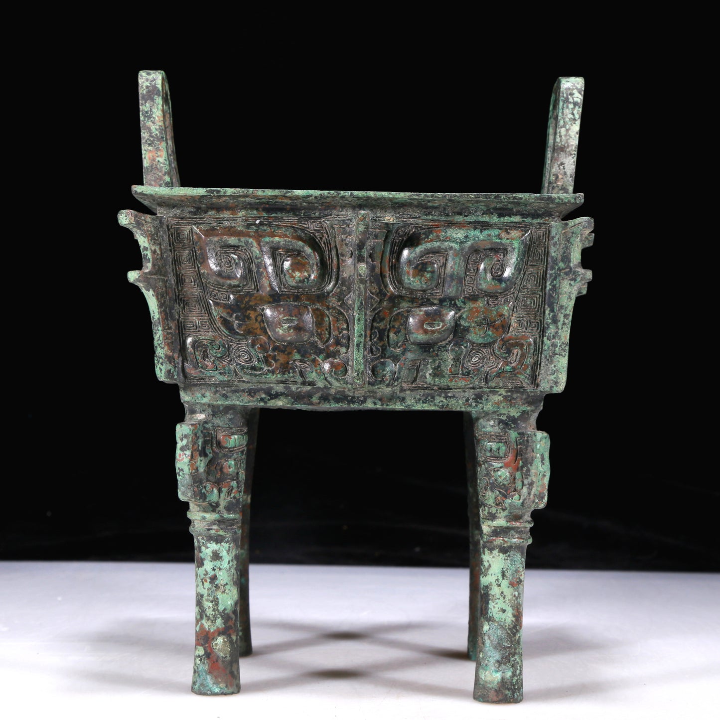 A Precious Bronze 'Animal Mask' Ritual Food Vessel, Ding, With Inscriptions