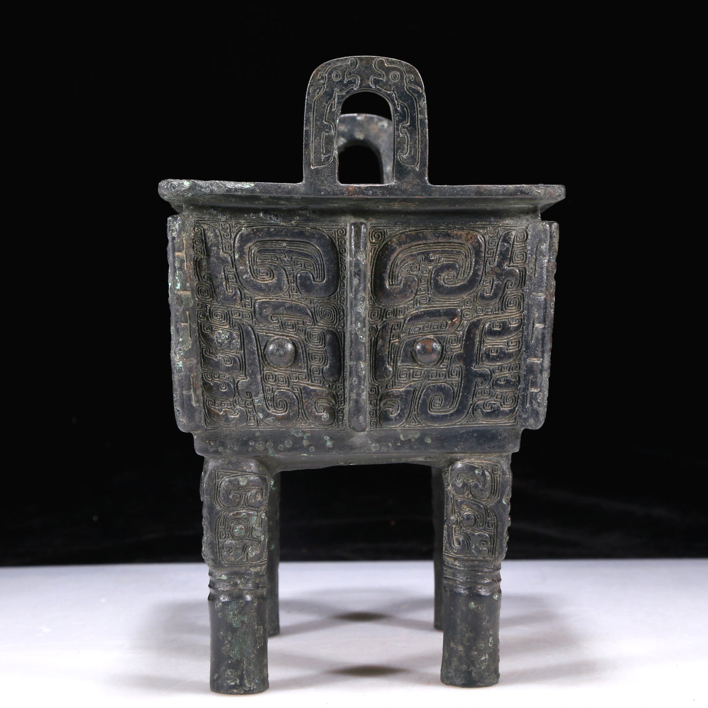 A Precious Bronze 'Animal Mask' Ritual Food Vessel, Ding