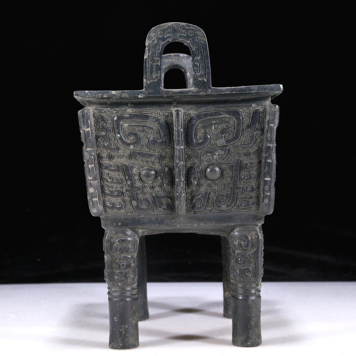 A Precious Bronze 'Animal Mask' Ritual Food Vessel, Ding