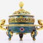 A cloisonné incense burner with two ears and three legs with lotus pattern