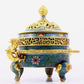 A cloisonné incense burner with two ears and three legs with lotus pattern