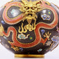 A cloisonné vase with auspicious clouds and dragon pattern