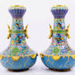 A pair of cloisonné butterfly and flower pattern amphora