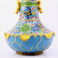 A pair of cloisonné butterfly and flower pattern amphora